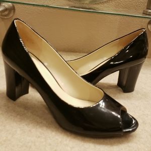 Black patent peep-toe size 10 heels, verily worn.